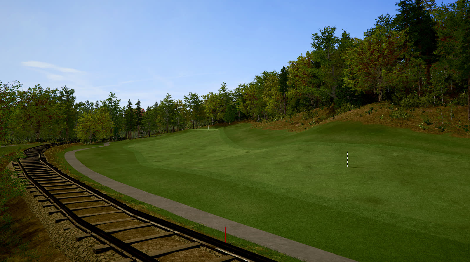 The railway running beside the fairway